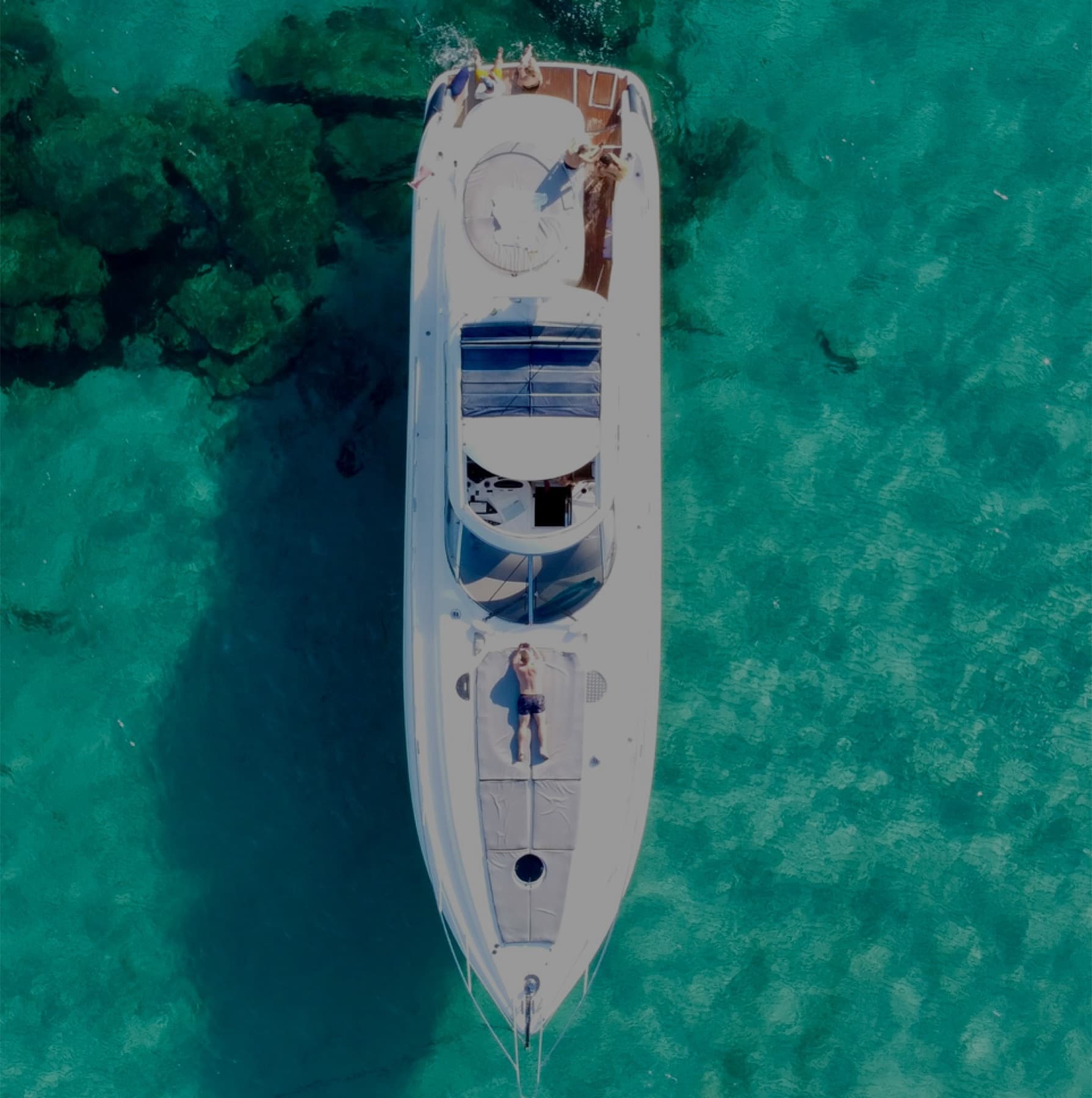Private yacht charter cruising past the Miami skyline at sunset
